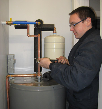 plumbing-chris-fixing-water-heater